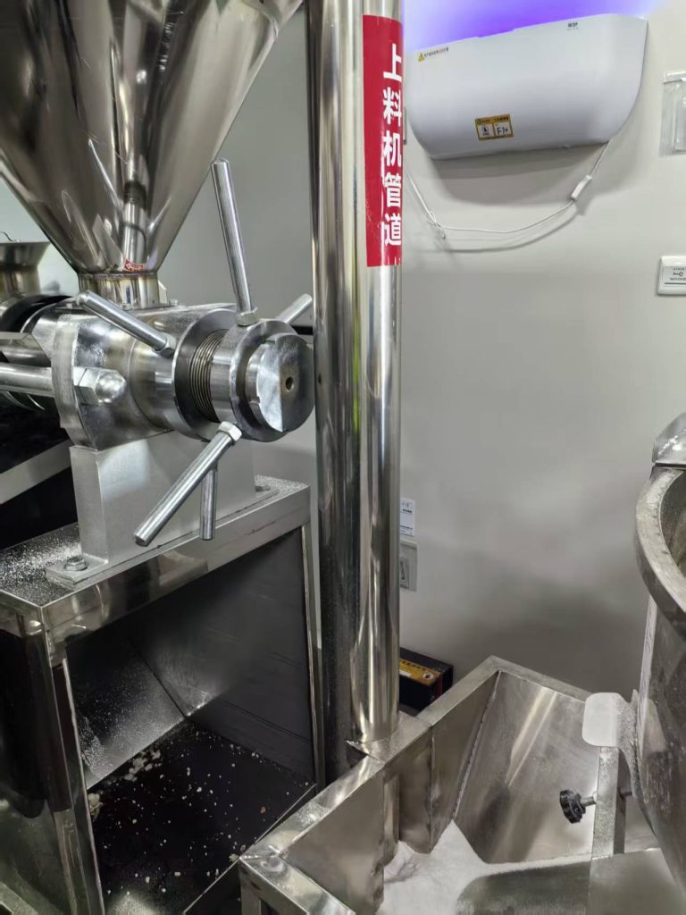 Stainless elevator for dried coconut material (768x1024)